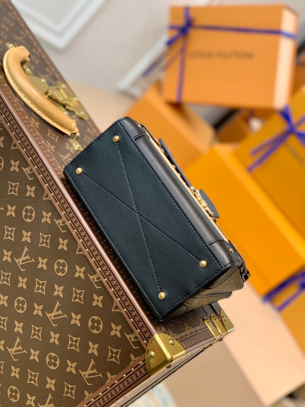 TRIANON PM 21 IN BROWN MONOGRAM COATED CANVAS AND BLACK CALFSKIN SIGNATURE S-LOCK