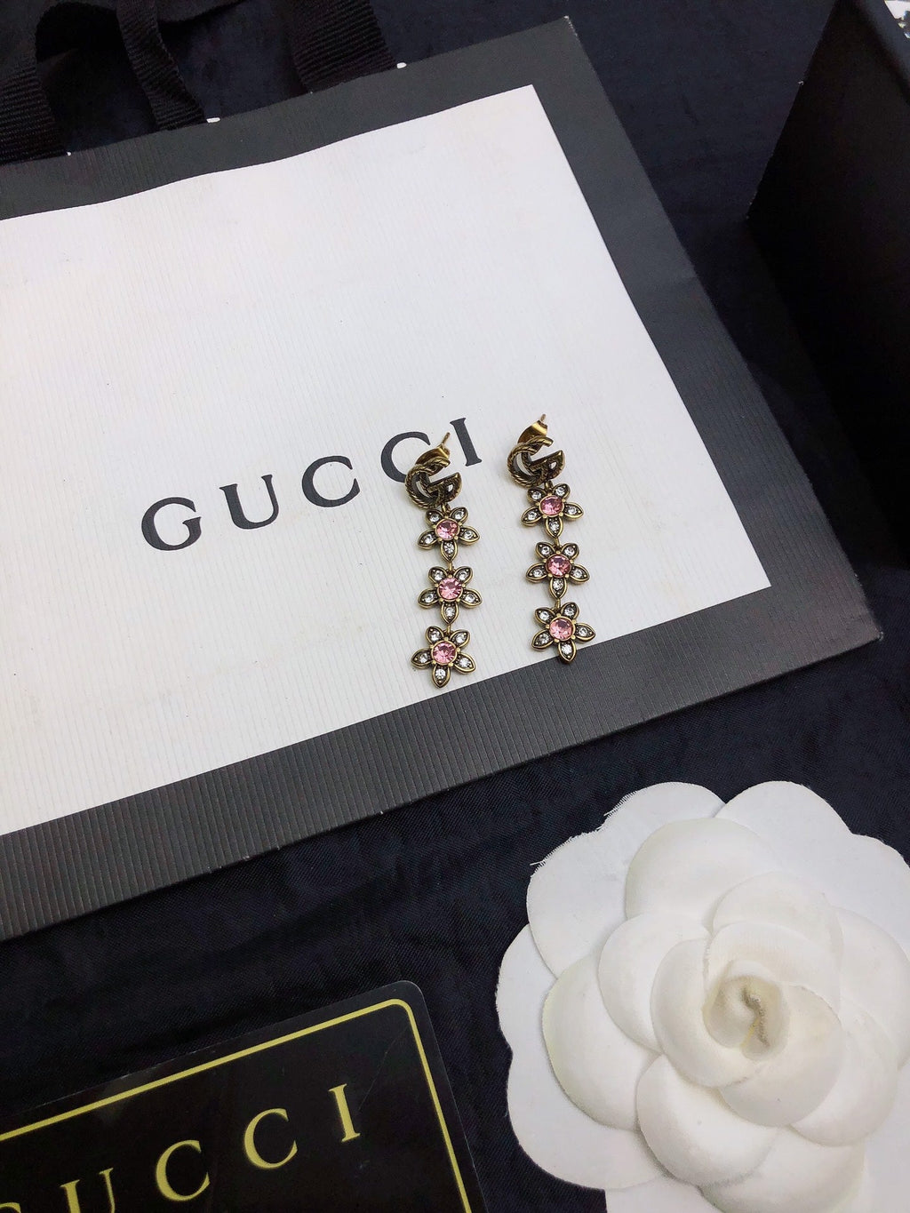 GUCCI 26S DOUBLE G LOGO PINK CRYSTAL FLORAL DROP EARRINGS IN AGED GOLD TONE METAL 629030