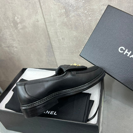 CHANEL 26S LOAFERS IN BLACK QUILTED CALFSKIN WITH CC LOGO