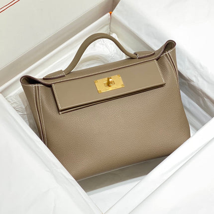 HM 26S 24/24 29MM IN BROWN EVERCOLOR CALFSKIN GOLD KELLY BUCKLE