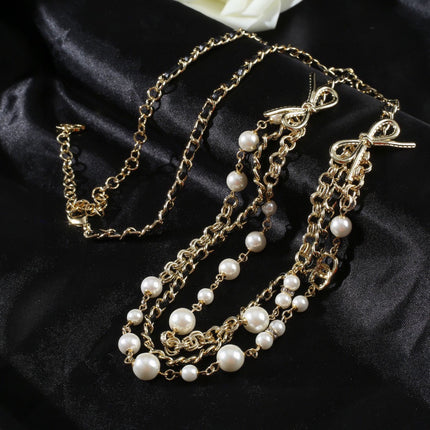 CHANEL 25S GOLD CHAIN BELT WITH PEARL 610440
