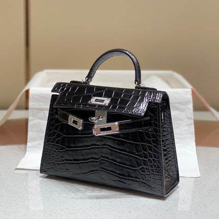 HERMES 25S MINI KELLY 19 IN BLACK CALFSKIN SILVER HARDWARE