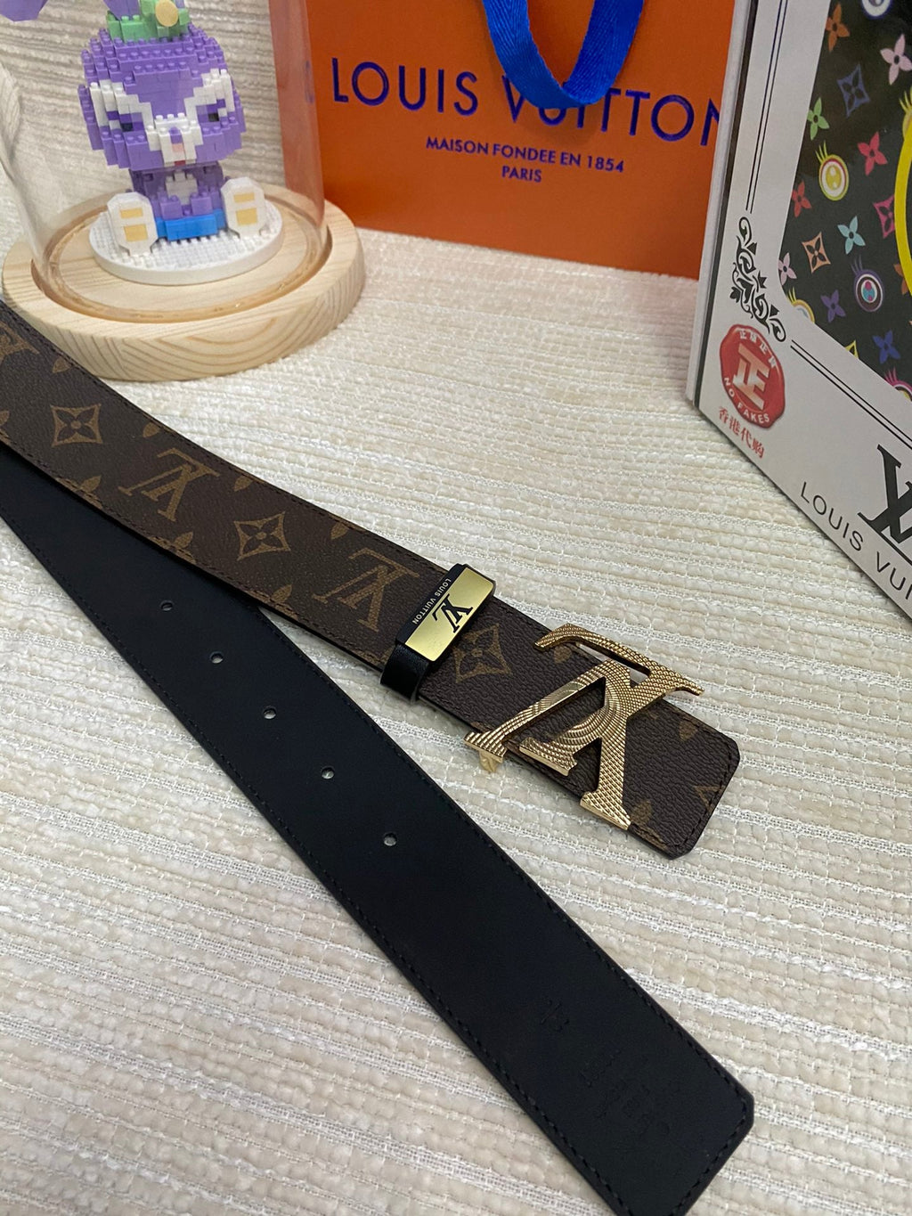 LV 25S BELT 38 MM IN DARK BROWN CALFSKIN PRINT PATTERNS 593286