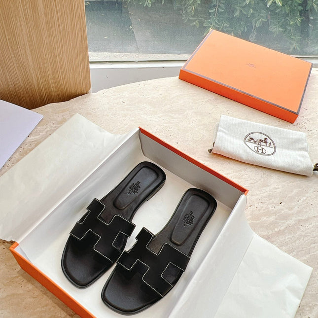 0RAN SANDAL IN BLACK CALFSKIN 202622