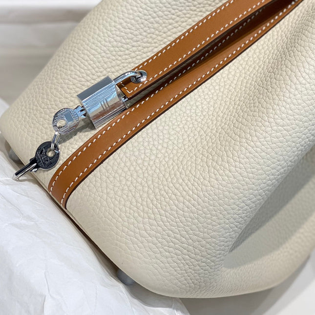 HERMES 25S PICOTIN LOCK 18 IN BURNT ORANGE AND IVORY CALFSKIN SILVER HARDWARE