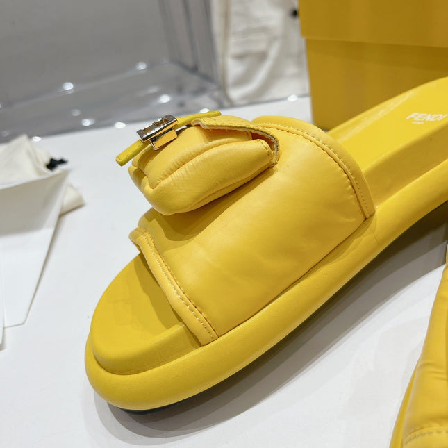FENDI BAGUETTE SLIPPERS IN NAPLES YELLOW LAMBSKIN WITH GOLD HARDWARE