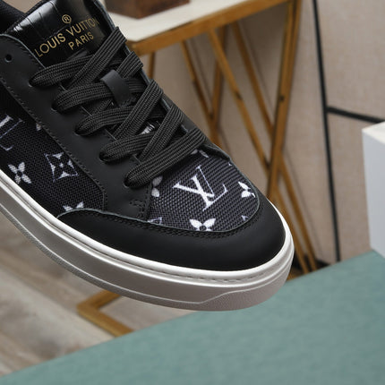 LV TRAINERS IN BLACK CALFSKIN AND MONOGRAM CANVAS