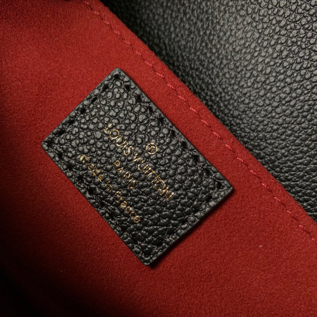 POCHETTE MÉTIS EAST WEST 21 IN BLACK AND BEIGE MONOGRAM EMPREINTE CALFSKIN EMBOSSED LOGO
