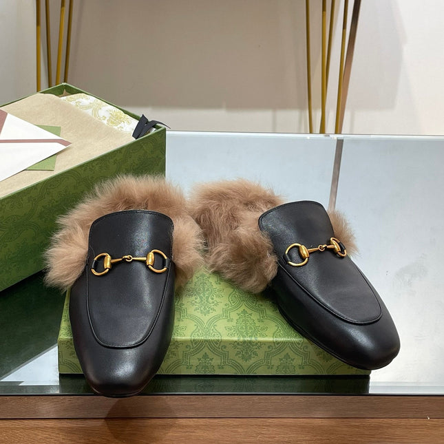 HORSEBIT MULE IN BLACK CALFSKIN AND LAMB WOOL LINING