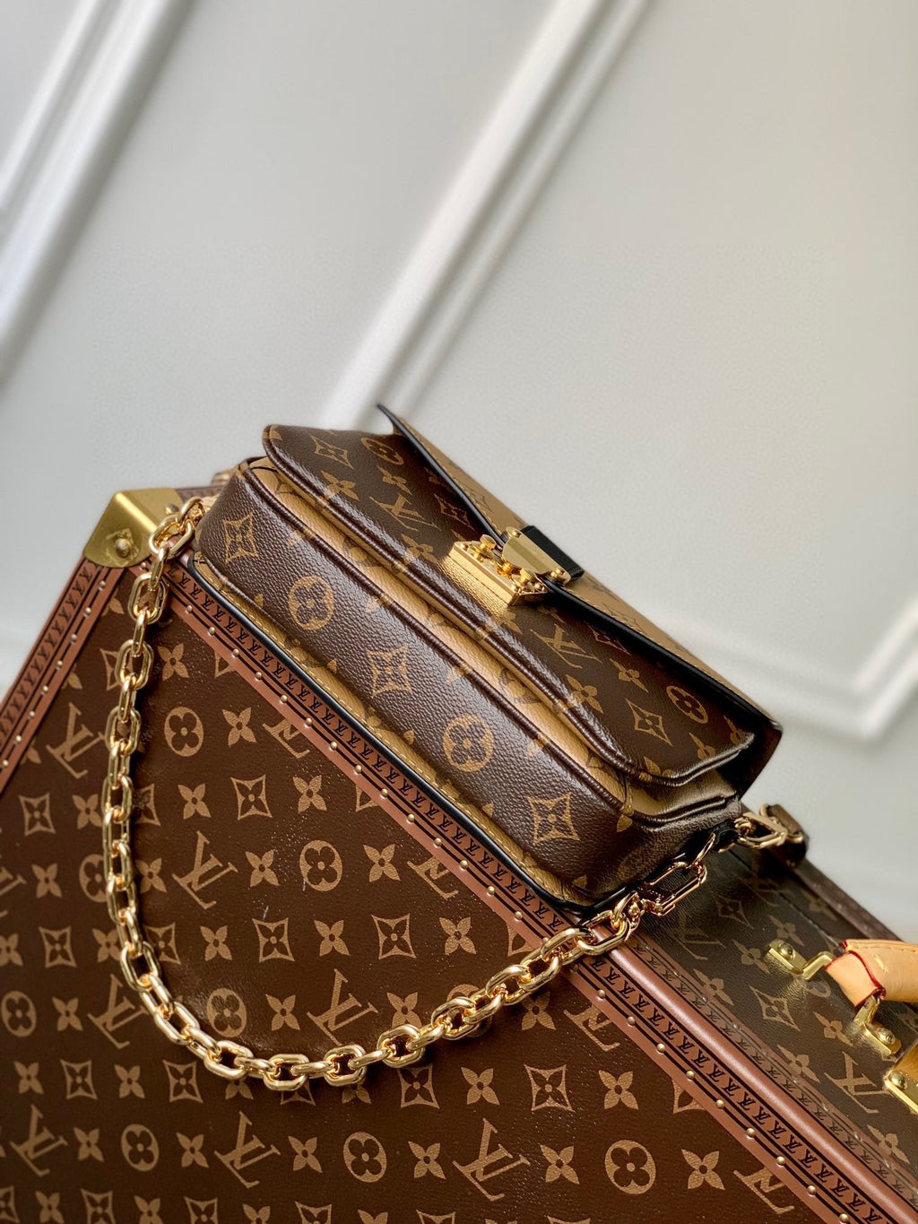 POCHETTE MÉTIS EAST WEST 21.5 IN BROWN MONOGRAM COATED CANVAS AND CALFSKIN