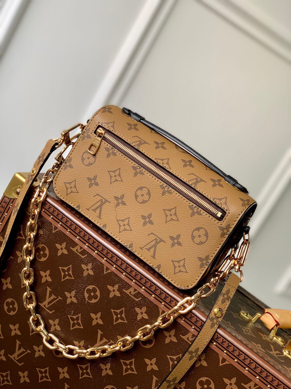 POCHETTE MÉTIS EAST WEST 21.5 IN BROWN MONOGRAM COATED CANVAS AND CALFSKIN