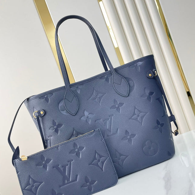 NEVERFULL MM 31 IN DARK NAVY MONOGRAM EMPREINTE LEATHER