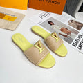 LV 26S FLAT SLIDES IN LIGHT YELLOW CALFSKIN AND BEIGE RAFFIA