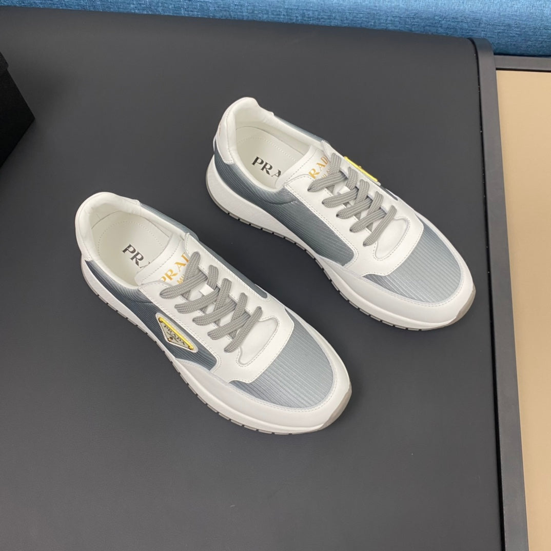 PRA SNEAKER IN WHITE CALFSKIN AND SILVER FABRIC WITH GOLDEN LOGO