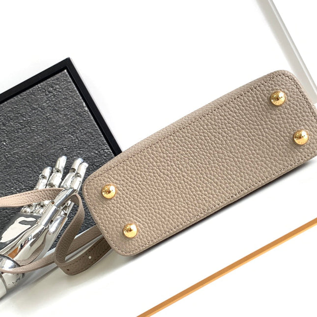 CAPUCINES MINI 21 IN KHAKI BROWN TAURILLON GOLD HARDWARE