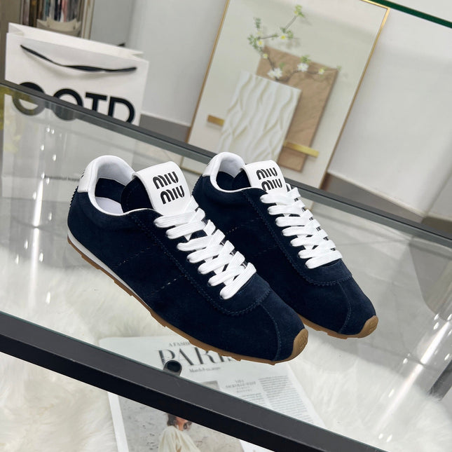 MIUMIU 26S SNEAKERS IN BLUE BLACK SUEDE