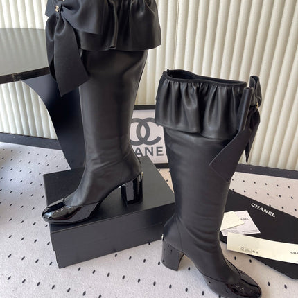 CHANEL BOW HIGH BOOTS IN BLACK CALFSKIN