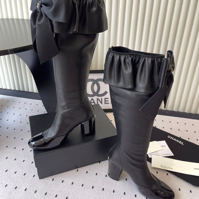 CHANEL BOW HIGH BOOTS IN BLACK CALFSKIN