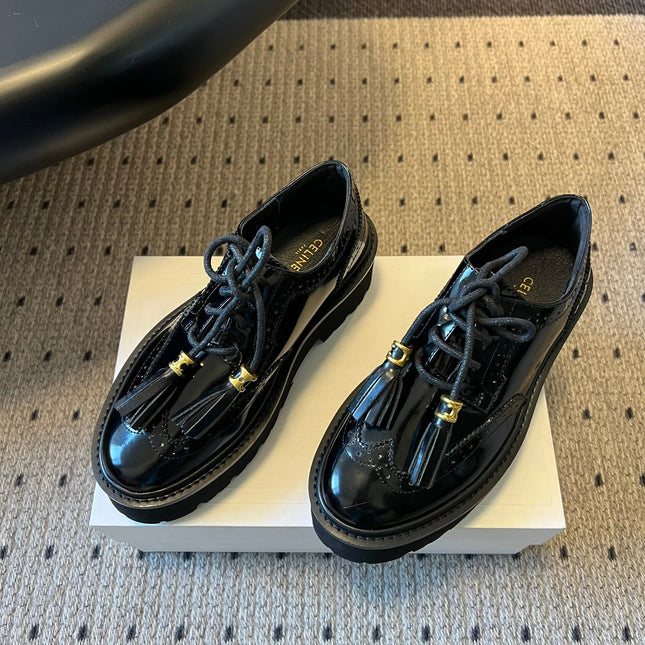 CELINE 26S SAINTNJORD TASSEL LOAFER 50 MM IN BLACK CALFSKIN