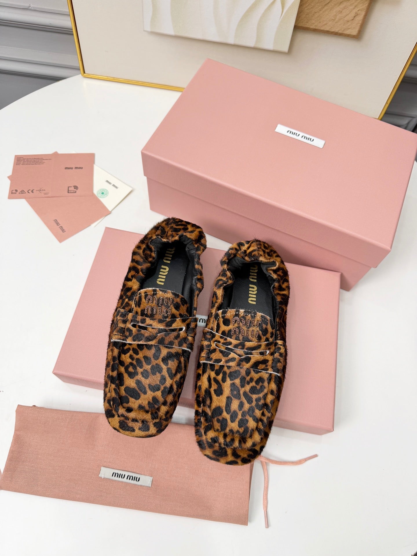 MIUMIU 26S RUCHES LOAFERS IN LEOPARD PRINT PONY HAIR