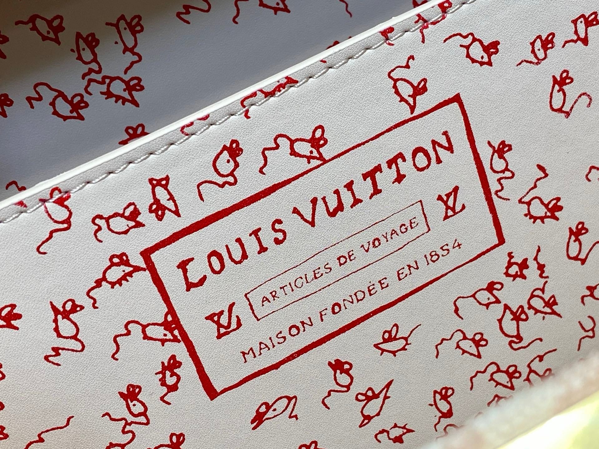 LV TRUNK 22 IN LIGHT PINK CANVAS GOLD HARDWARE