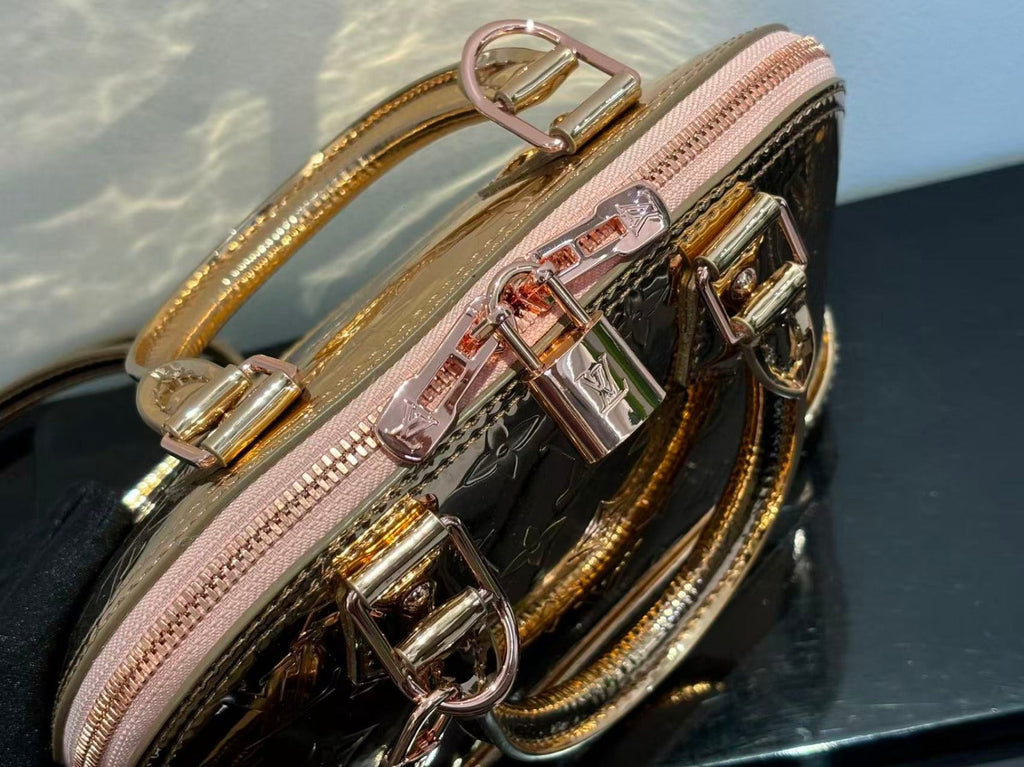 SPEEDY 23 IN GOLD MONOGRAM EMBOSSED CALFSKIN