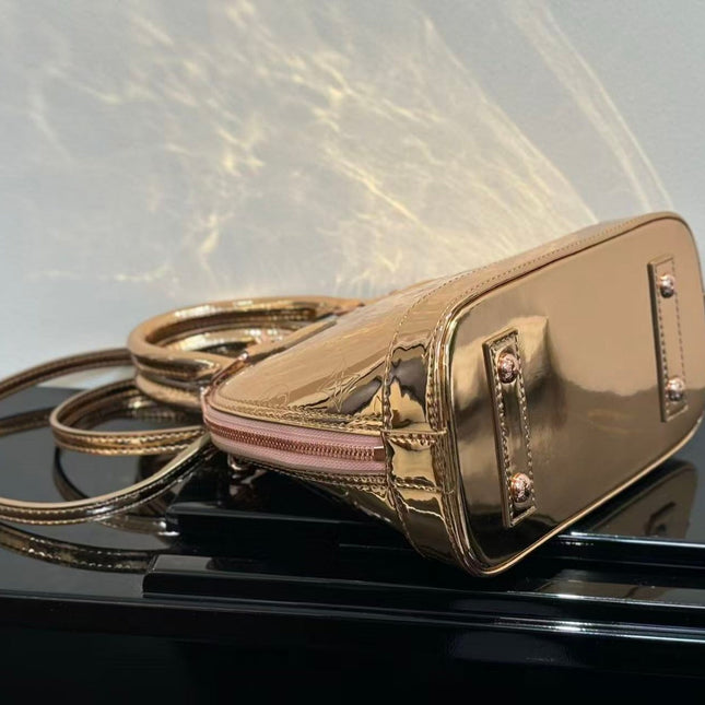 SPEEDY 23 IN GOLD MONOGRAM EMBOSSED CALFSKIN