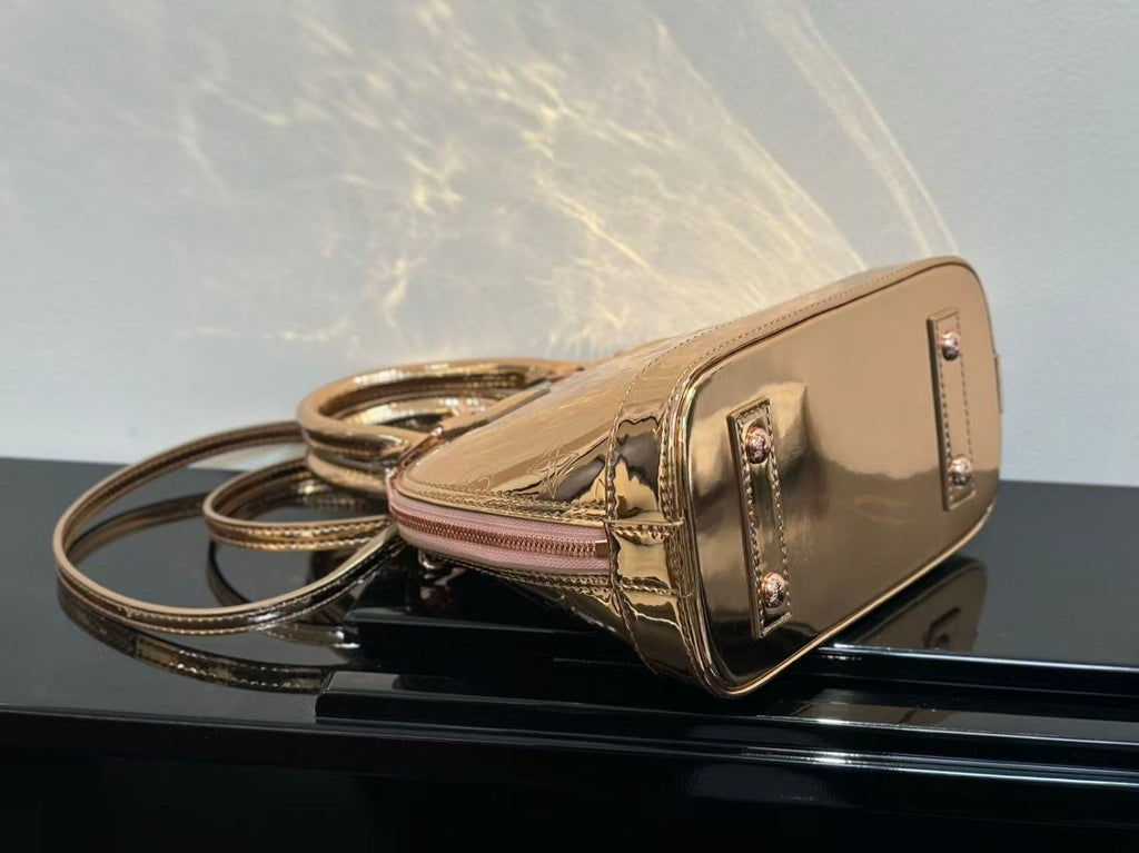 SPEEDY 23 IN GOLD MONOGRAM EMBOSSED CALFSKIN