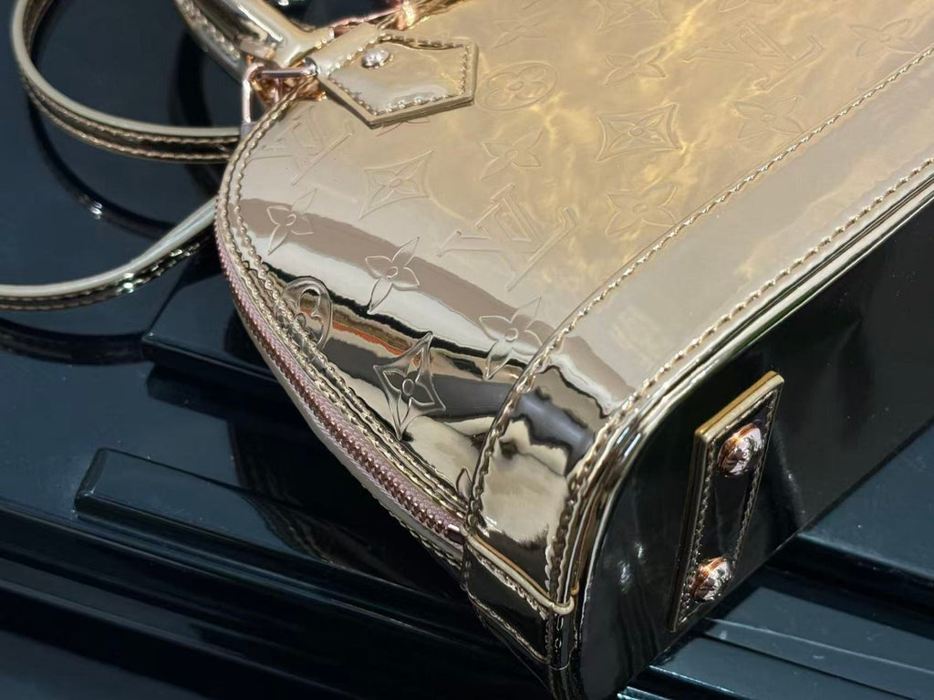 SPEEDY 23 IN GOLD MONOGRAM EMBOSSED CALFSKIN