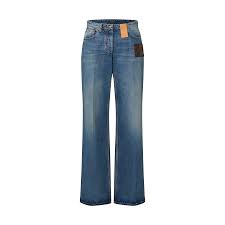 LV HIGH WAIST JEANS IN SIGNATURE MONOGRAM PATCH DENIM
