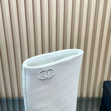 CHANEL 25S HIGH BOOTS 65MM IN WHITE CALFSKIN GOLD HARDWARE