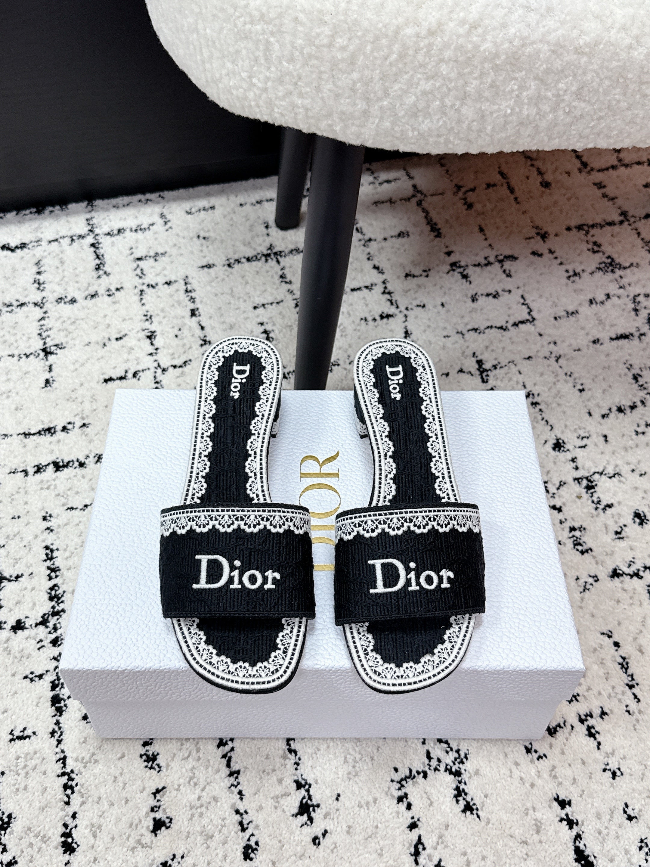 DIOR 26S HIGH HEEL SLIDES IN BLACK AND WHITE EMBOSSED OBLIQUE LACE EMBROIDERY