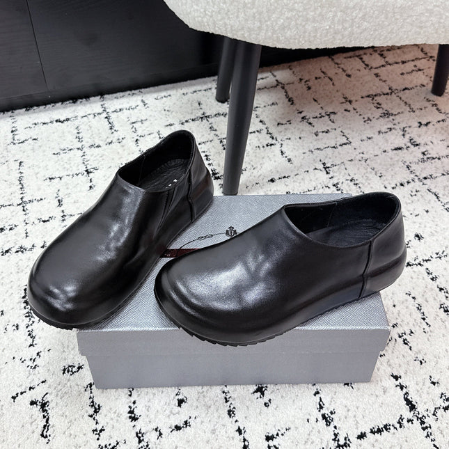 PRADA 26S SLIP ON SHOES IN BLACK SMOOTH CALFSKIN