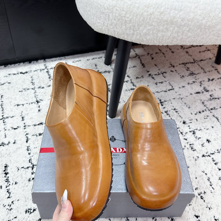 PRADA 26S SLIP ON SHOES IN WARM BROWN SMOOTH CALFSKIN