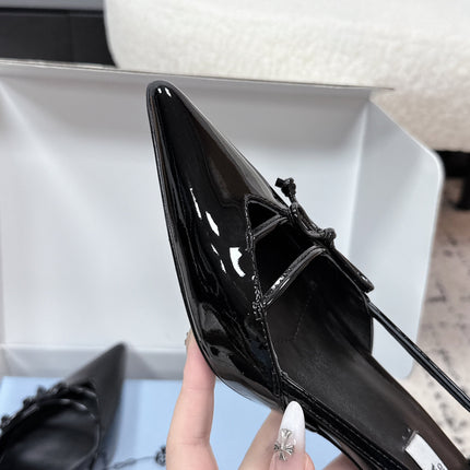 PRADA 26S POINTED-TOE HIGH HEELS 55MM IN BLACK PATENT CALFSKIN WITH BOW