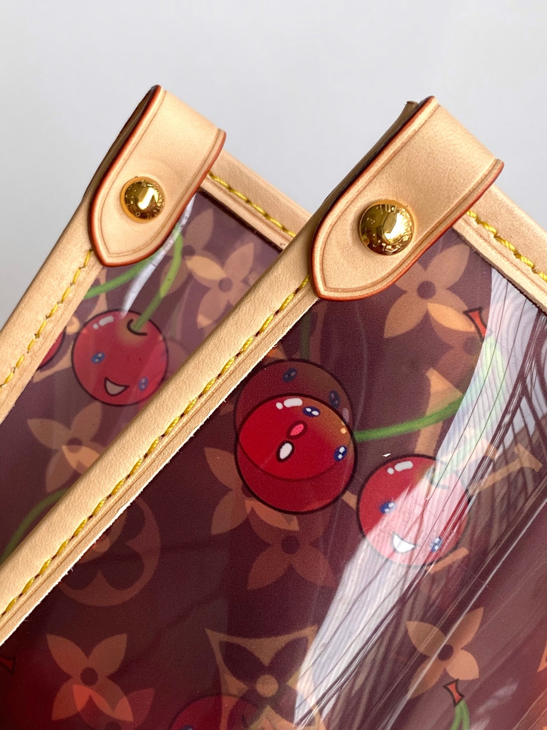 LV 26S ONTHEGO TOTE 41 IN CHERRY RED CLEAR PVC AND CALFSKIN