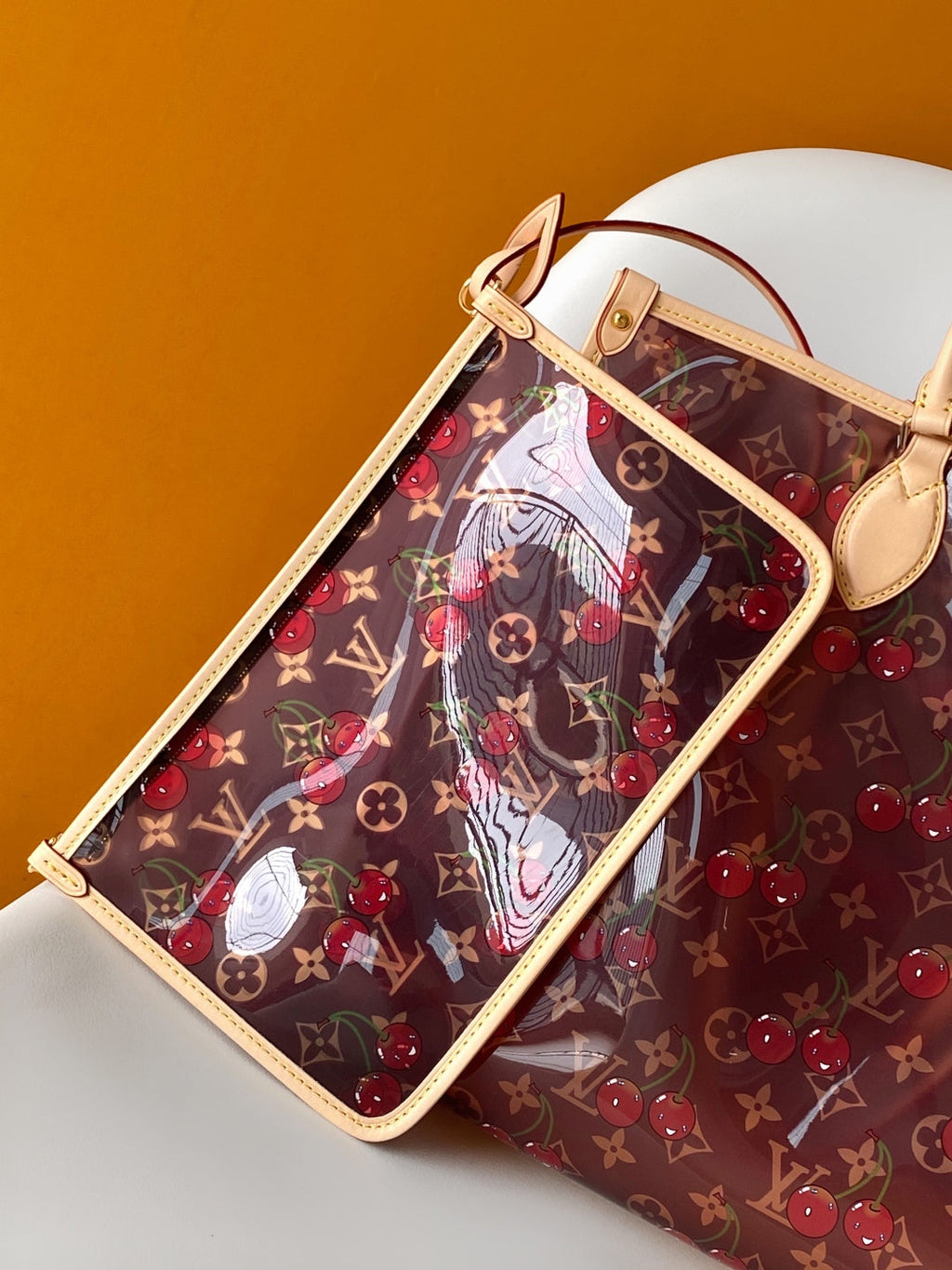 LV 26S ONTHEGO TOTE 41 IN CHERRY RED CLEAR PVC AND CALFSKIN