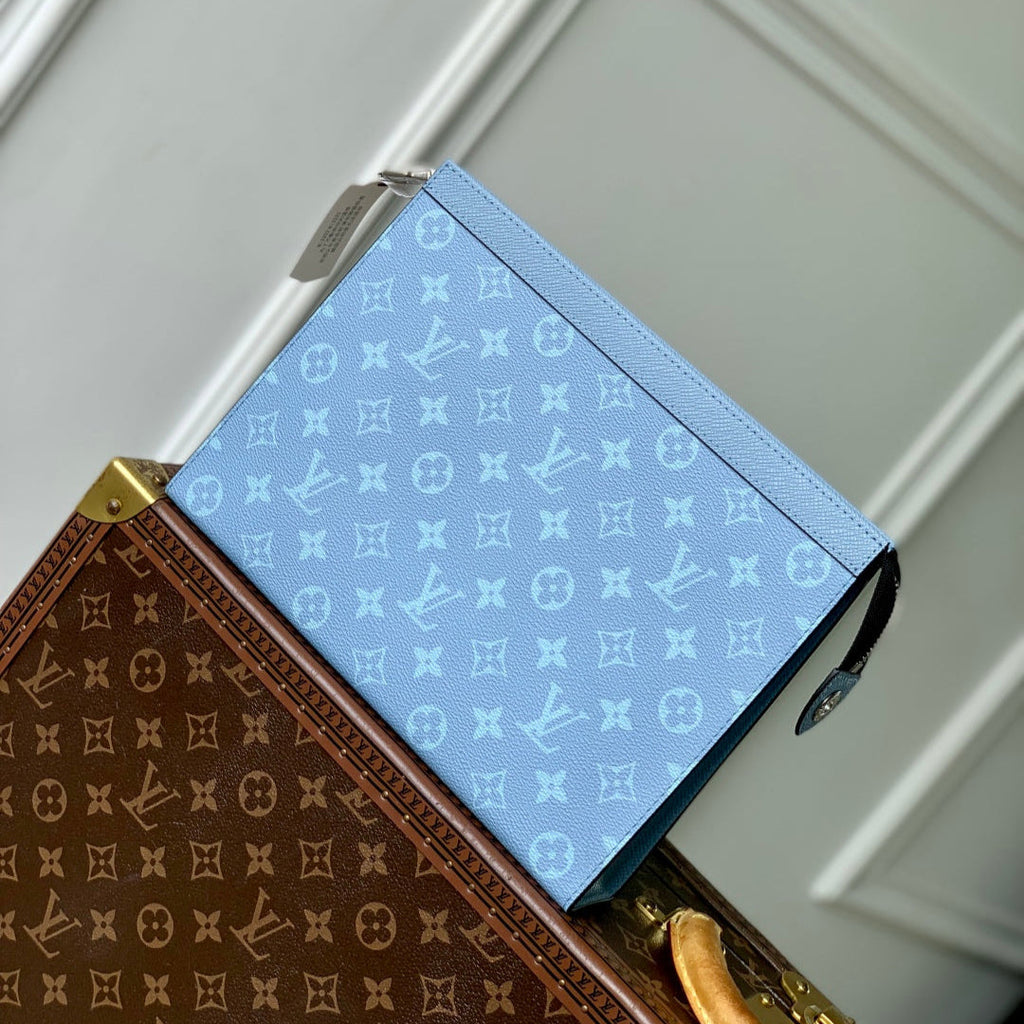 POCHETTE VOYAGE 26 IN LIGHT BLUE MONOGRAM ECLIPSE CALFSKIN