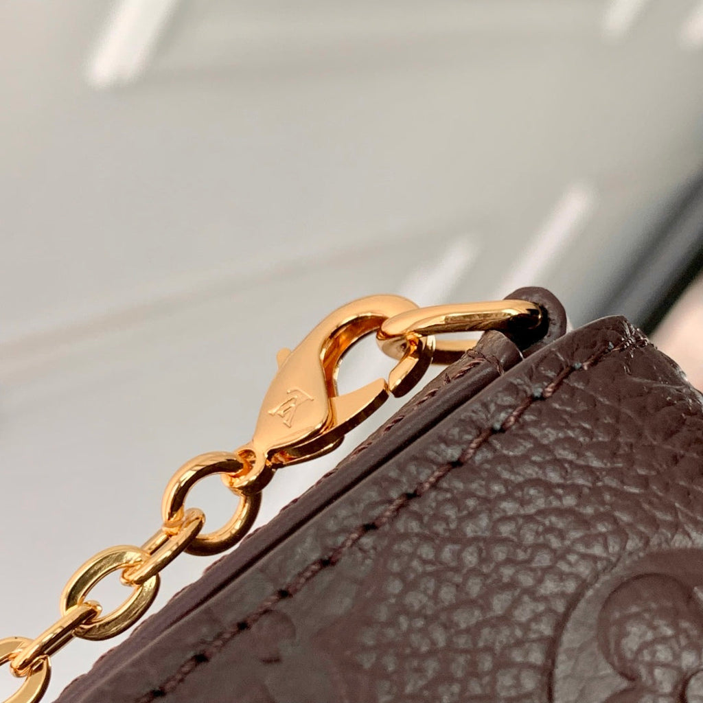 FÉLICIE POCHETTE 21 IN DARK BROWN MONOGRAM EMBOSSED LOGO CALFSKIN