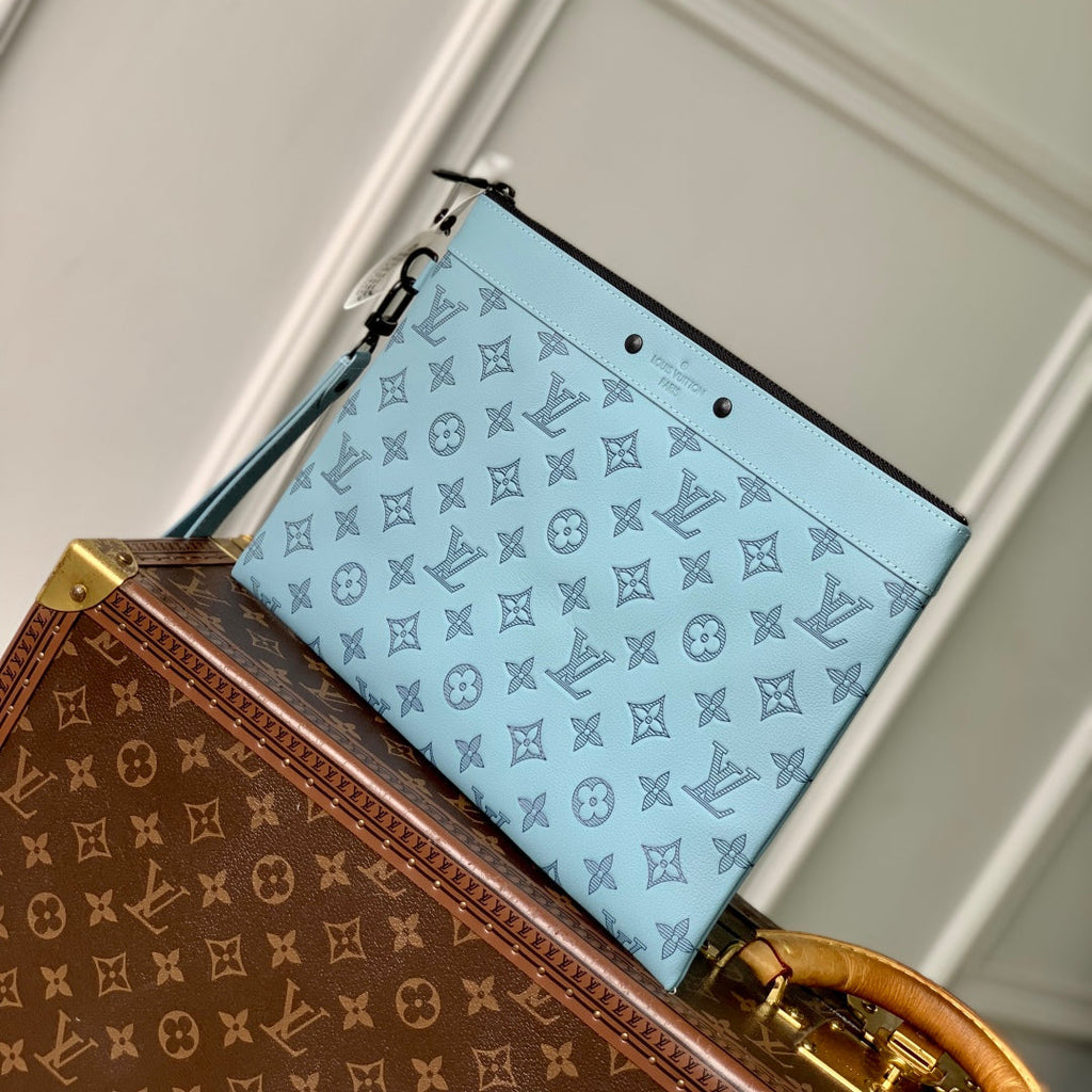 POCHETTE TO GO 30 IN SKY BLUE MONOGRAM SHADOW CALFSKIN EMBOSSED LOGO