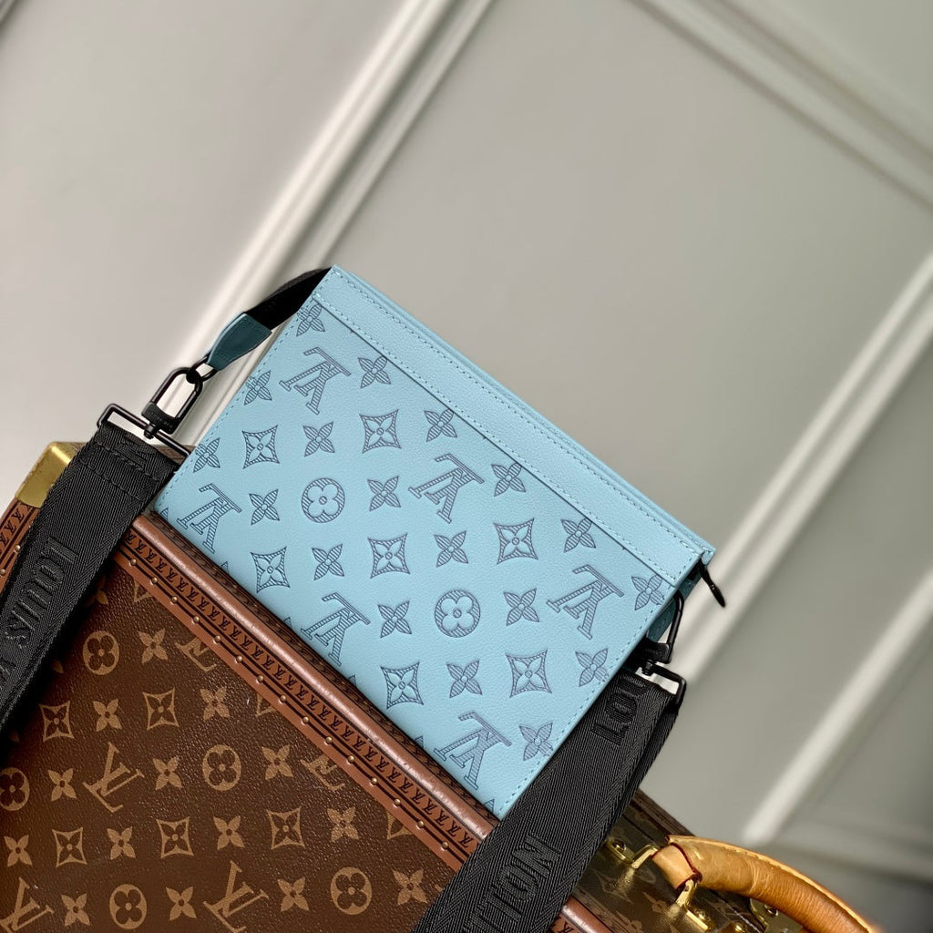 GASTON WEARABLE WALLET 22 IN SKY BLUE MONOGRAM SHADOW CALFSKIN EMBOSSED LOGO