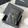CLASSIC VERTICAL CARD HOLDER 14 IN BLACK GRAINED CALFSKIN GOLD-TONE METALLIC