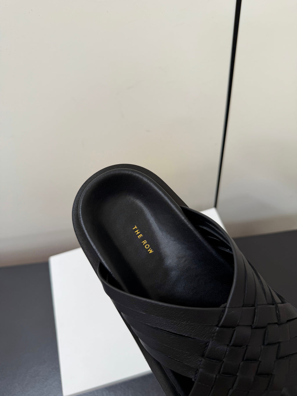THE ROW 26S CROSS STRAP SANDALS IN BLACK CALFSKIN