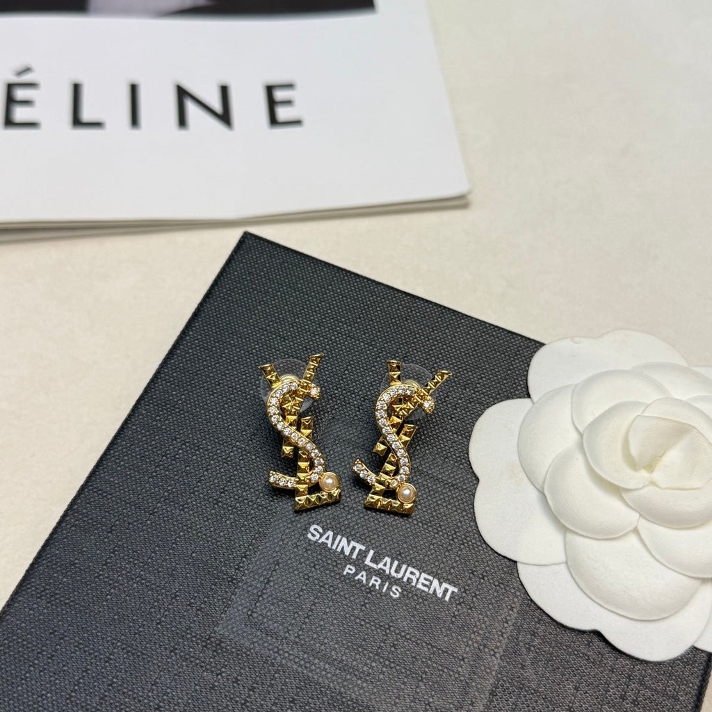 YSL 26S STUDDED CRYSTAL PEARL LOGO EARRINGS IN GOLD TONE METAL 629138
