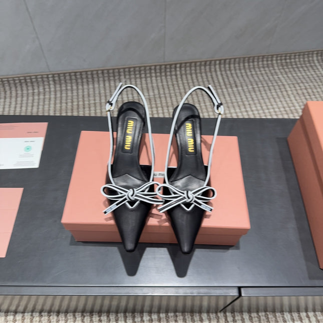 MIUMIU 26S SLINGBACK 55MM IN BLACK AND WHITE CALFSKIN WITH BOW