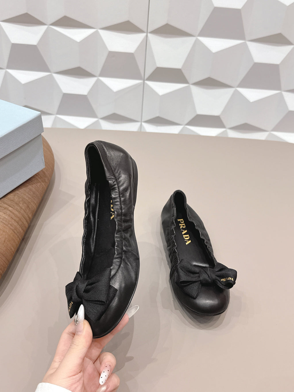 PRADA 26S ROUND TOE FLATS WITH BOW IN BLACK CALFSKIN