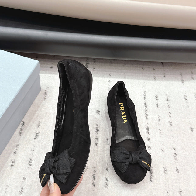 PRADA 26S ROUND TOE FLATS WITH BOW IN BLACK SUEDE