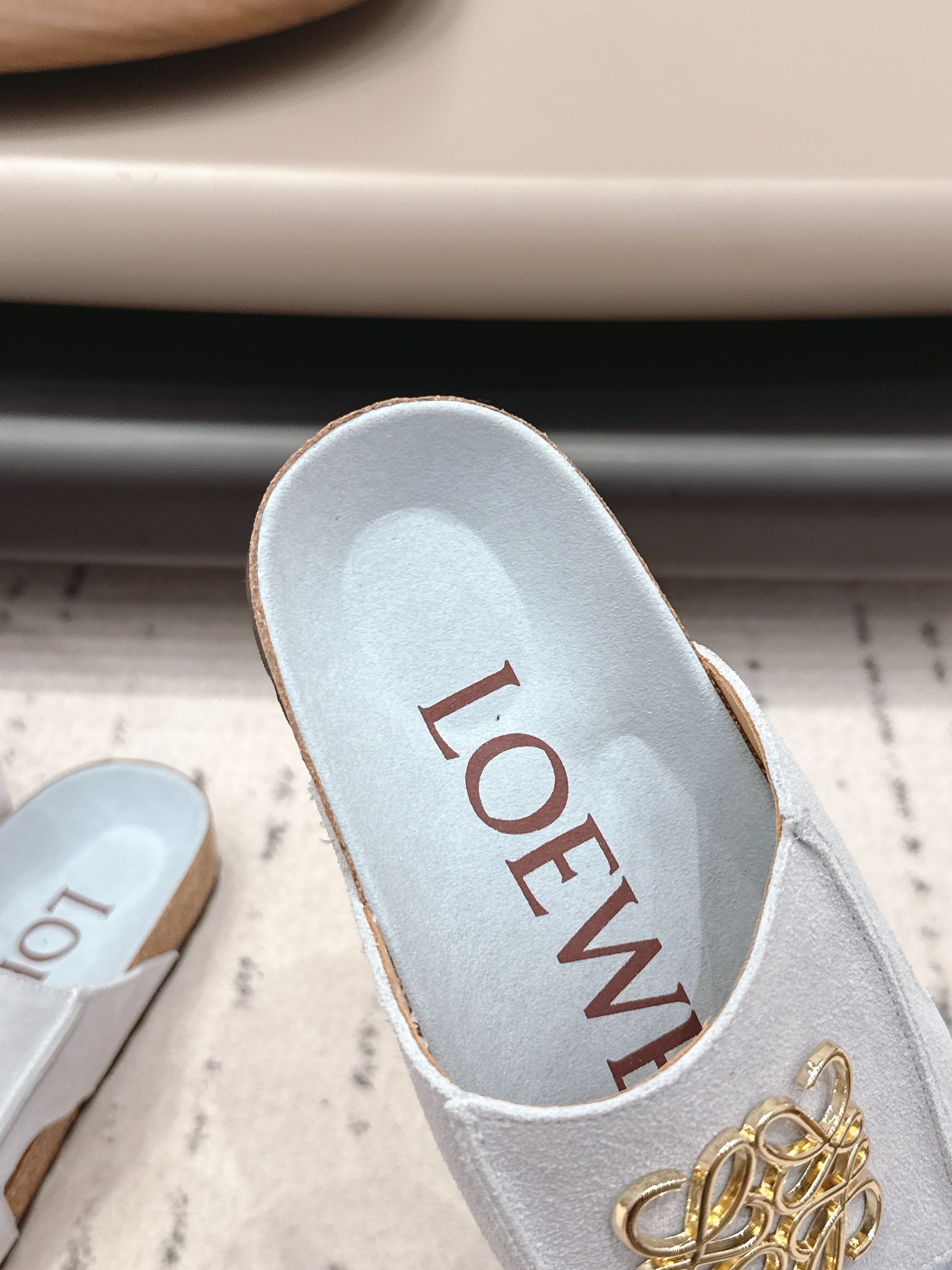 LOEWE 26S FLAT SANDALS IN LIGHT BLUE LOGO GOLD HARDWARE
