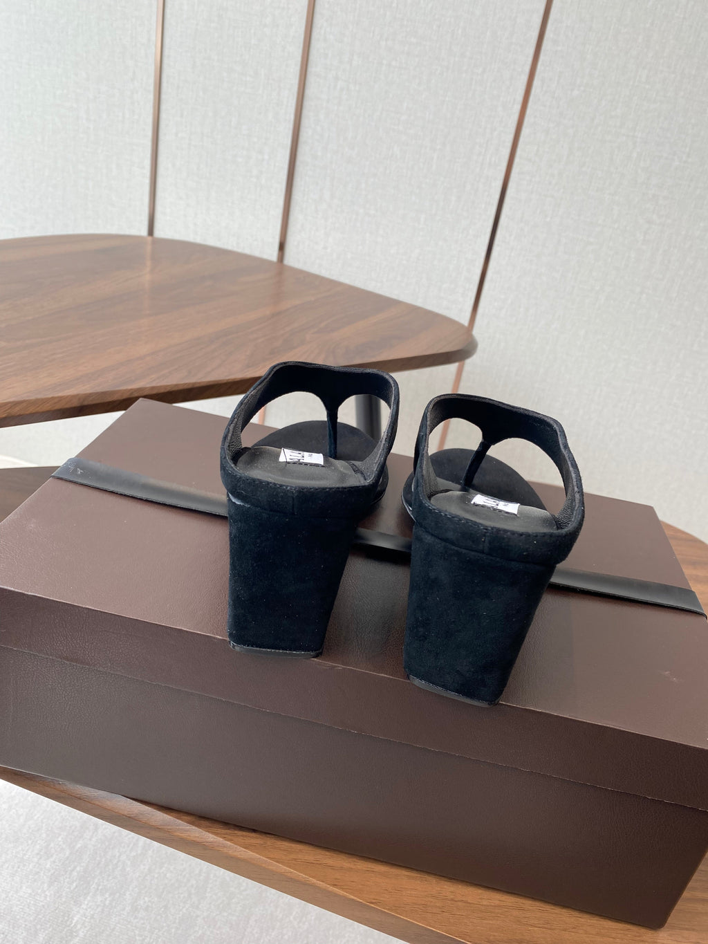 ALAIA WEDGE THONG SANDALS 25S IN BLACK SUEDE