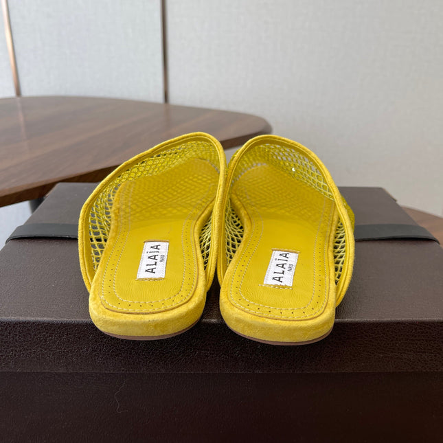 ALAIA 26S FLAT MULES IN DARK YELLOW SUEDE AND MESH RHINESTONE-EMBELLISHED